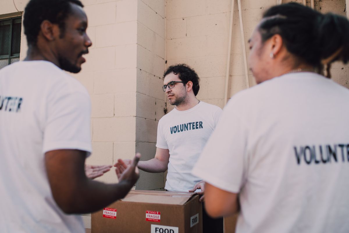 Volunteers organizing community food donations